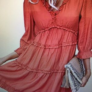 Burnt orange colored short dress